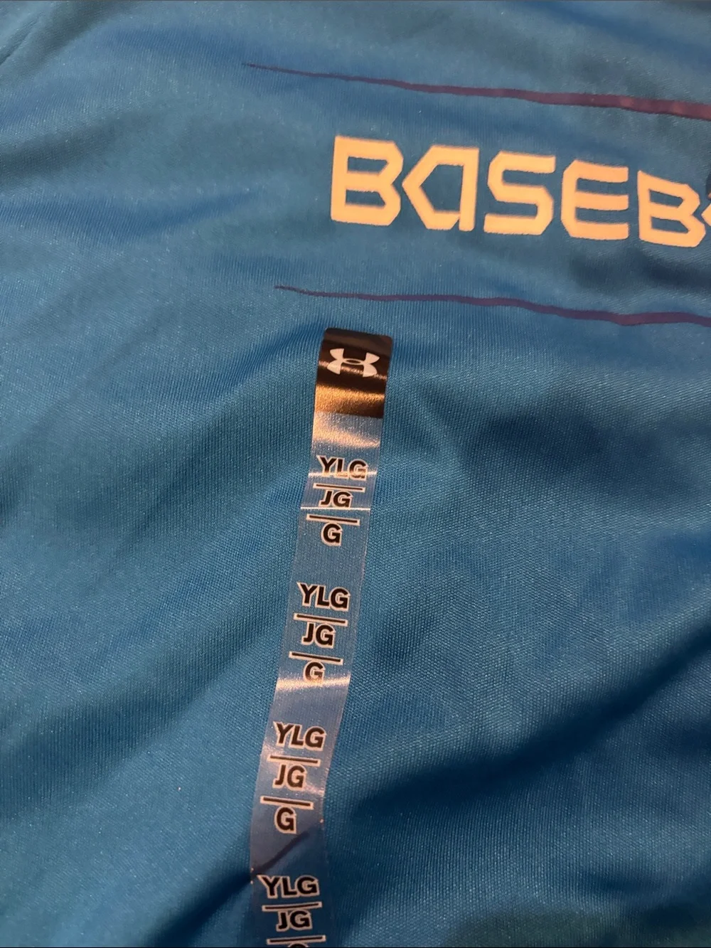 Under Armor boy’s large Bright Blue Long-Sleeve Baseball Performance Tee